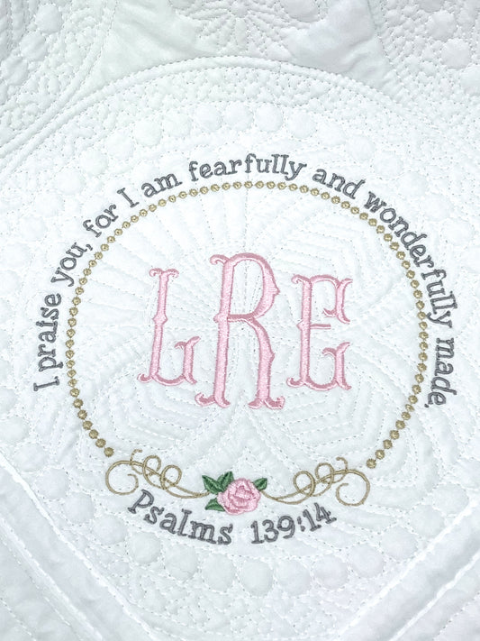 baby quilt with embroidered bible verse and monogram