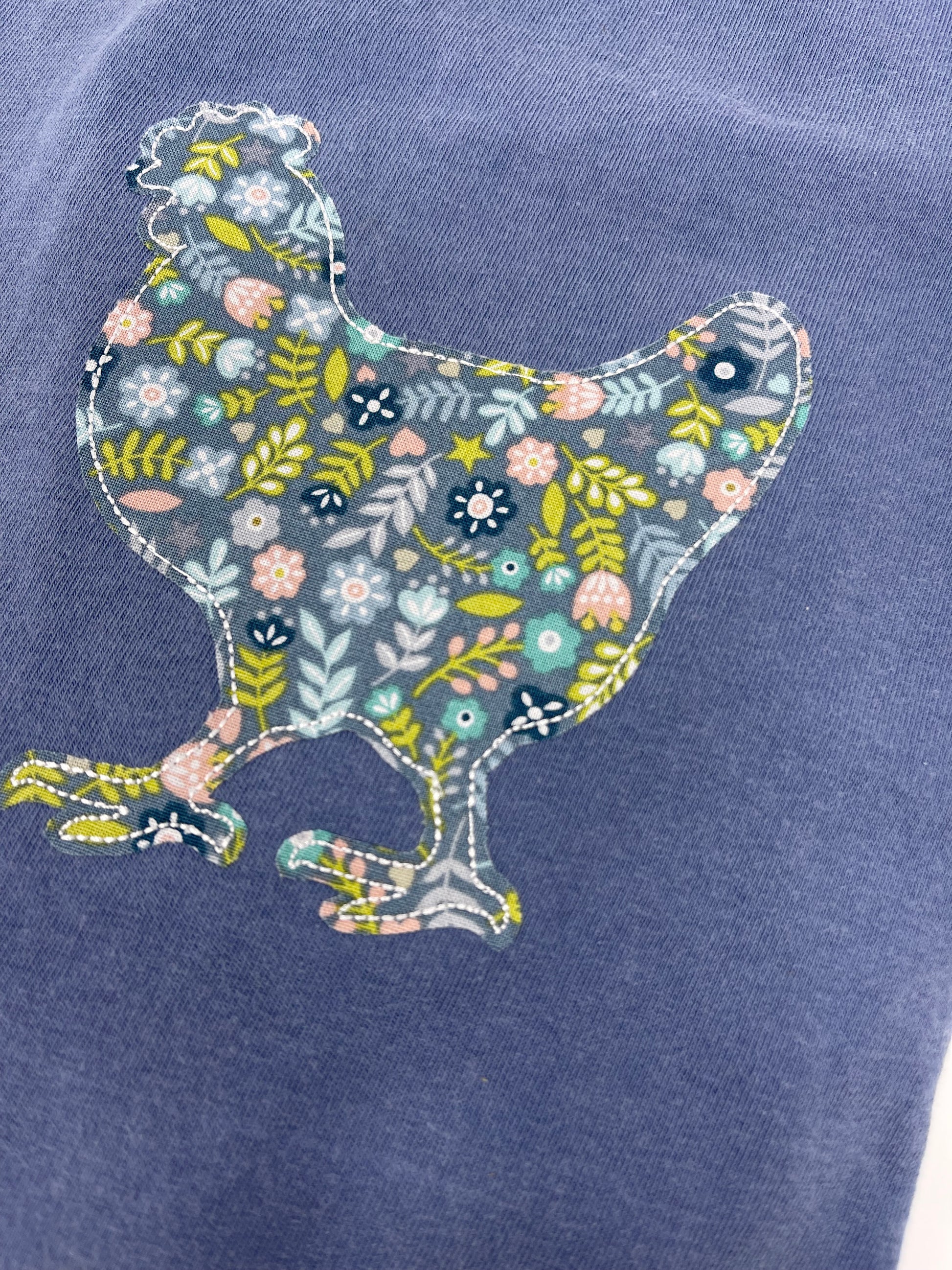 blue t-shirt with chicken applique